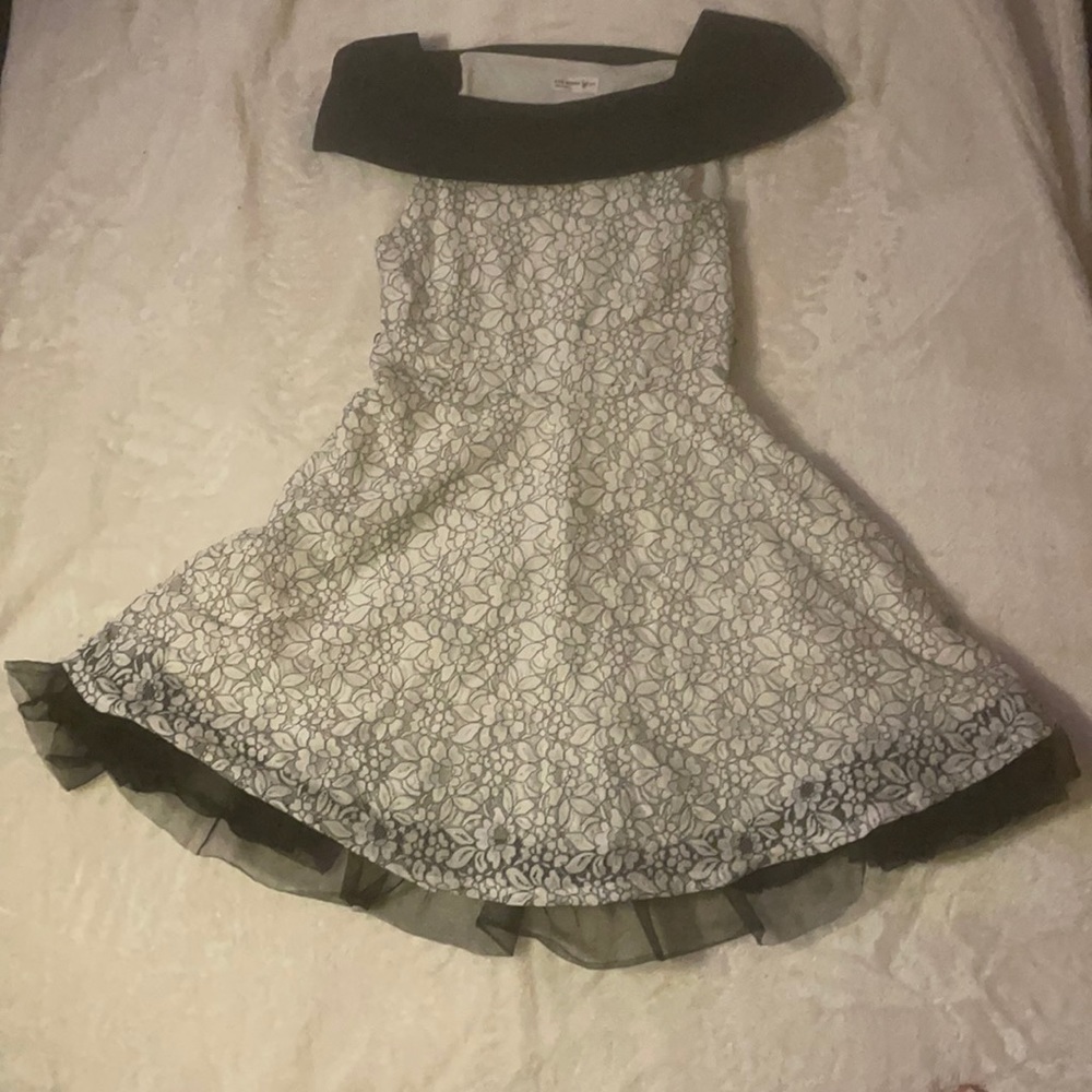 Back and white floral lace over the shoulder party dress